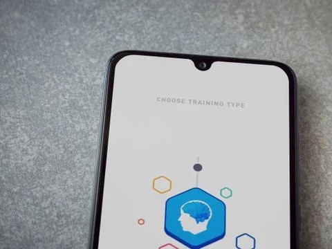 Elevate - Brain training games app launch screen with logo on the display of  Stock Photos