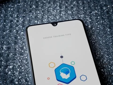 Elevate - Brain training games app launch screen with logo on the display of  Stock Photos