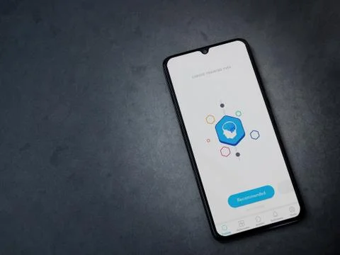 Elevate - Brain training games app launch screen with logo on the display of  Stock Photos