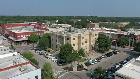 Elevated Aerial View of Historic Courthouse and Downtown McKinney Texas Stock Footage 165077198