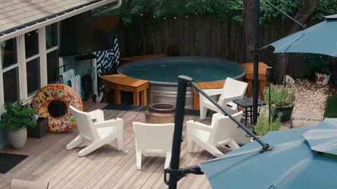 Elevated Backyard Stocktank Pool Deck White Adirondack Chairs Outdoor TV Donut Stock Footage 334353005