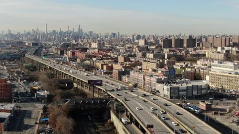 Elevated Bronx highway sweeping toward the Midtown Manhattan skyline Stock Footage 99364118