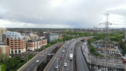 Elevated busy multilane road leading through town Stock Footage 156698516