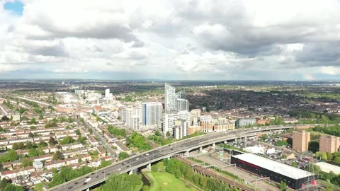 Elevated busy multilane road in town, group of tall buildings Stock Footage 156700994