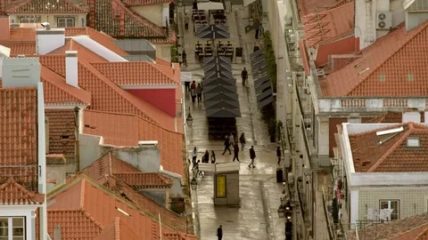 Elevated clip of narrow pedestrian side street in central Lisbon Stock Footage 119056889