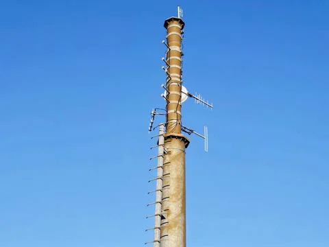 Elevated concrete skyscraper with numerous cellular units and safety featur.. Фото