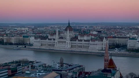 Elevated day to night time lapse view of the Hungarian Parliament Stock Footage 170371694