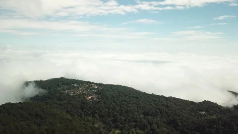 Elevated Drone View of Traditional Mountain Village with Cloud and Fog Stock-Footage 333697441