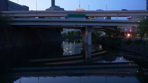 Elevated Expressway Reflected in a Moat Stock Footage 90501975