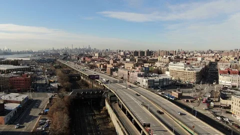 Elevated expressway viaduct cutting through the Bronx toward Manhattan Stock-Footage 99364111