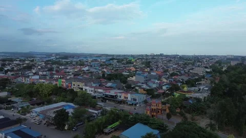 Elevated Glimpse into Batam's Vibrant Urban Fabric and Extensive Community .. Stock Footage 339036802
