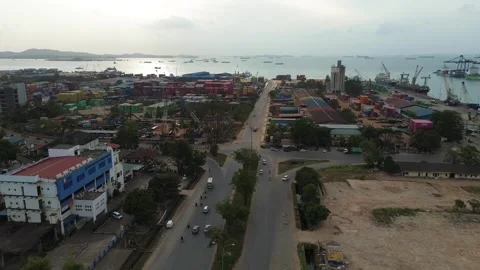 Elevated glimpse into the complex interplay of a busy seaport, thoroughfare.. Video stock 339035303