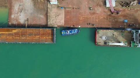 An Elevated Glimpse into the Intricate Dance of Commercial Vessels at a Thr.. Video stock 325309860