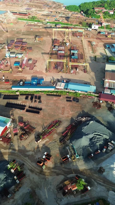 Elevated Glimpse of a Sprawling Maritime Industrial Hub, Featuring Material.. Video stock 337282818