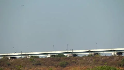 Elevated highway bridge over dry landscape Stock Footage 331277719