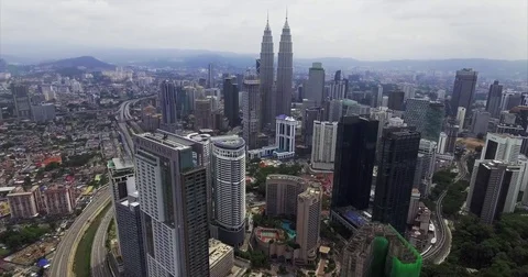Elevated Highway Curves Below the Petronas Twin Towers Stock Footage 70009877