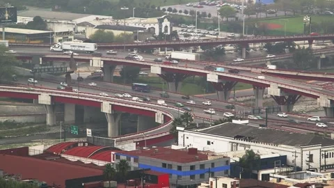 Elevated highway interchange with multiple overpasses Stock Footage 341297935