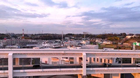Elevated Highway | Sunset Cityscape | Transport - 4K Aerial Video Stock Footage 333195080