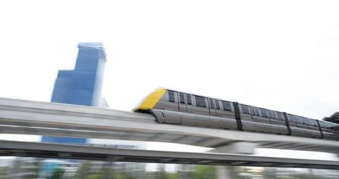 Elevated monorail train fast move on rail. Public transit monorail. Modern .. Foto stock