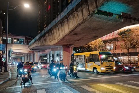 Elevated MRT Platform Overlooks Busy Neihu Streets on Taipei Night Stock Photos