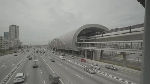 Elevated MRT railway station and highway, Malaysia, Puchong Stock Footage 86184913