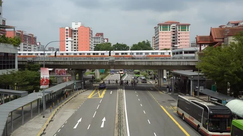 Elevated MRT Train and Small Light Rail in Singapore Stock Footage 114491255