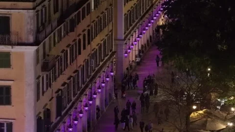 Elevated night view of the historic Liston arcade in Corfu town, Greece. Purple Stock Footage 333971033