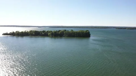Elevated Panorama of Forested Islands and Calm Canadian Lake Stock Footage 345422734
