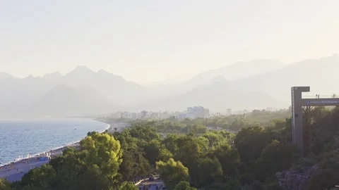 Elevated panoramic view of Antalya city with green trees, residential build.. Video stock 337795906