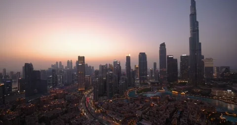 Elevated, panoramic view of the illuminated Dubai skyline Video stock 265763452