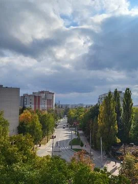 Elevated panoramic view over residential district and autumn trees Stock Photos