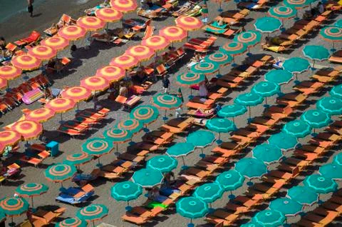 Elevated pattern view of famous beach umbrellas of Amalfi, a town in the Stock Photos