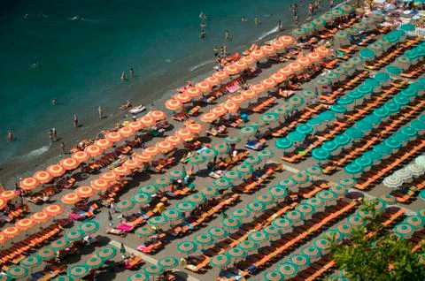 Elevated pattern view of famous beach umbrellas of Amalfi, a town in the Stock Photos