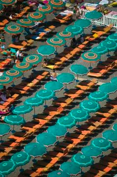 Elevated pattern view of famous beach umbrellas of Amalfi, a town in the Stock Photos