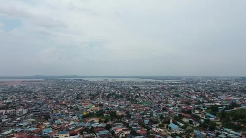 Elevated perspective revealing a sprawling cityscape with countless homes Stock Footage 319458868