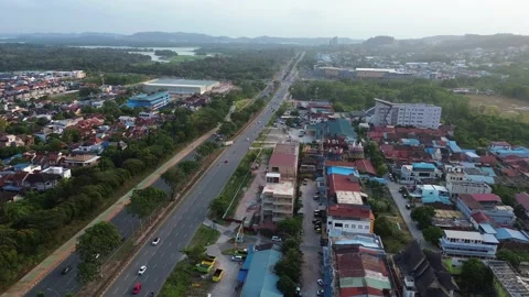 Elevated perspective of a vibrant tropical community, revealing dynamic roa.. 스톡 동영상 339033181