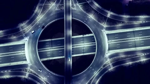 Elevated Road Junction And Interchange Overpass  At Night Traffic Timelapse Stock Footage