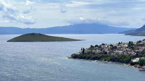 A elevated scenic view of Bitez in Bodrum, Turkey, showing white coastal houses, Stock Footage 346816478