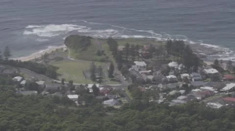 Elevated shot of headland with surf breaking Australia . Stock Footage 56479491
