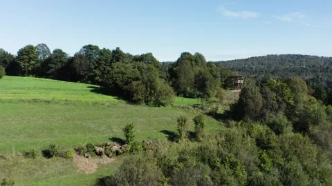 An elevated shot showcasing a blend of nature and human settlement. Stock Footage 287114546
