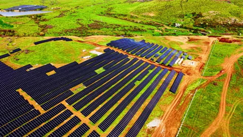 Elevated shot of solar farm construction near meadow, Bulgaria Stock Footage 339007039