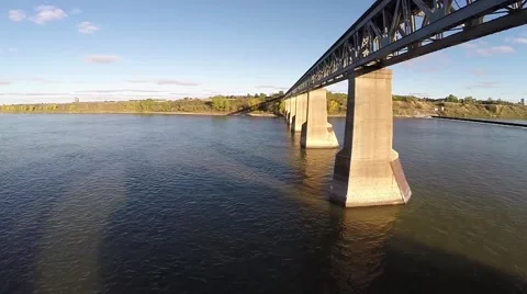 Elevated shot of a train bridge crossing the river Stock Footage 43314415