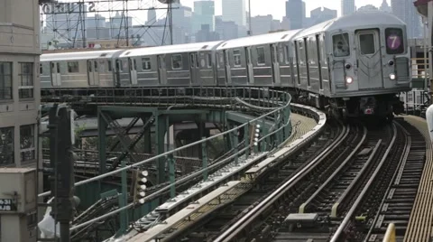Elevated subway train rolls into station Stock Footage 40521696