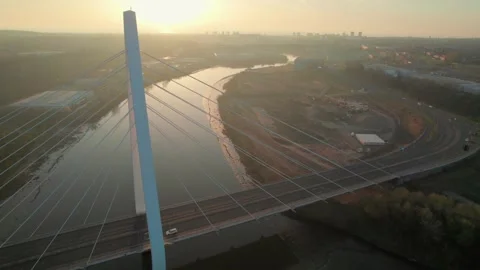 Elevated sunrise drone shot capturing Crown Works Studio construction site Stock Footage 310602339