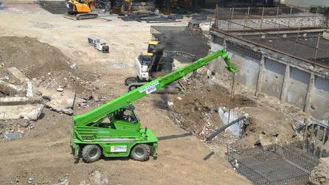 Elevated time lapse day view of workers at busy on-site construction area Stock Footage 92913515