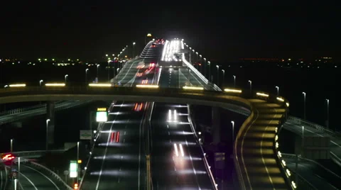 Elevated timelapse of rapid traffic through Umihotaru on the Aqualine. Stock Footage 61806148