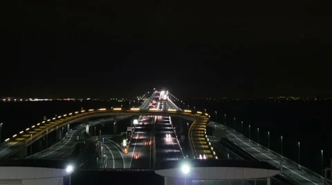 Elevated timelapse of rapid traffic through Umihotaru on the Aqualine. Stock Footage 61806198