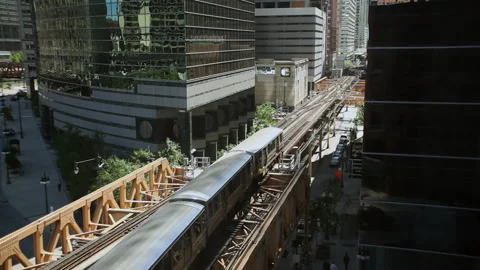 Elevated train in Chicago passing through city, Illinois USA Stock Footage 202903551