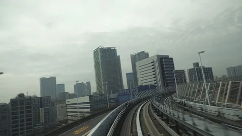 Elevated train line, Tokyo, Minato, Odaiba. The rainbow bridge. Urban landscape. Stock Footage 92005388