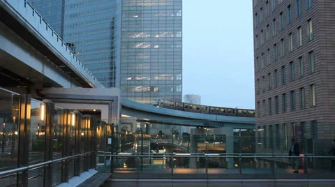 An elevated train passes through Tokyo Stock Footage 25821945